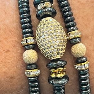 Bundle of 3 Hematite and Goldtone Stretch Bracelets